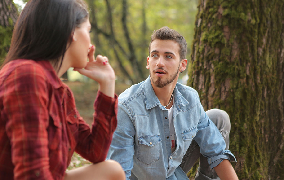 guy and girl sitting and talking guy and girl sitting and talking