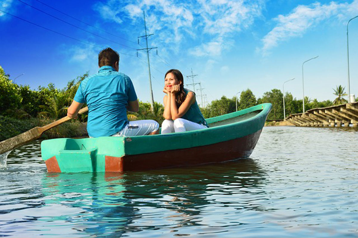 boyfriend and girlfriend in a boat