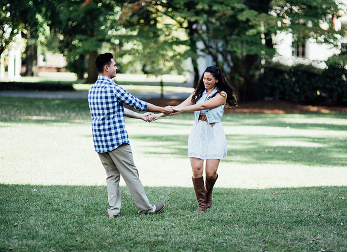 happy boyfriend and girlfriend at the park
